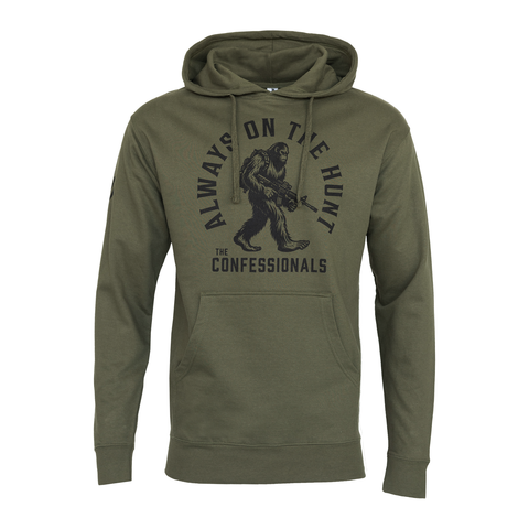 Army Hoodie with graphic of bigfoot holding gun with text "ALWAYS ON THE HUNT THE CONFESSIONALS"