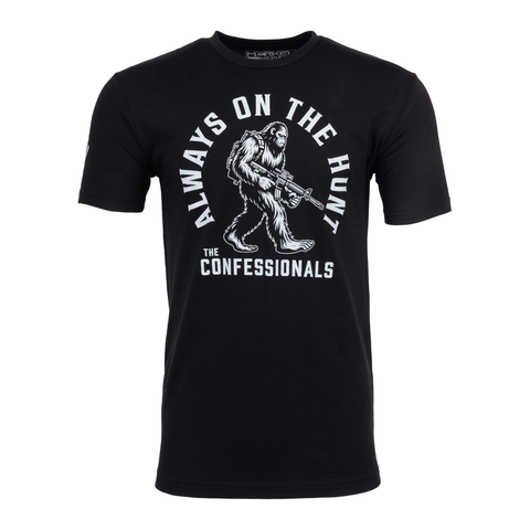 Black tee with graphic of bigfoot with gun with text "ALWAYS ON THE HUNT THE CONFESSIONALS"